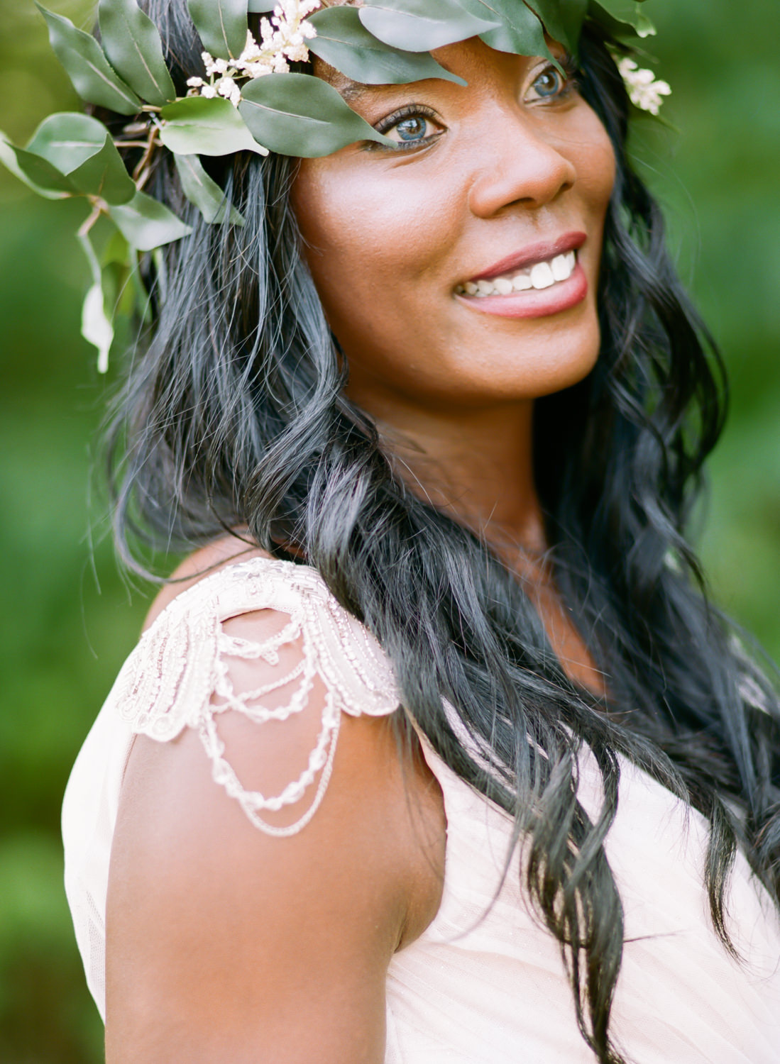 smiling bride with blue eyes and leaf crown, Erica Robnett Photography