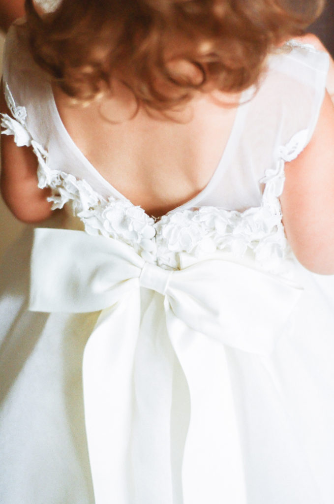 Flower girl dress detail, St. Louis fine art wedding photographer