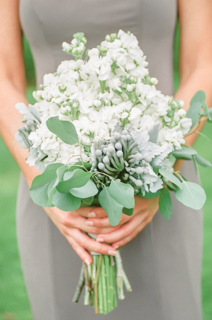 With bridesmaid bouquet with greenery, St. Louis fine art wedding photography