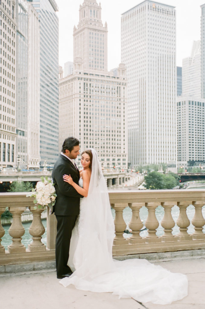 Bride and groom on Michigan Avenue in Chicago, Chicago fine art wedding photography