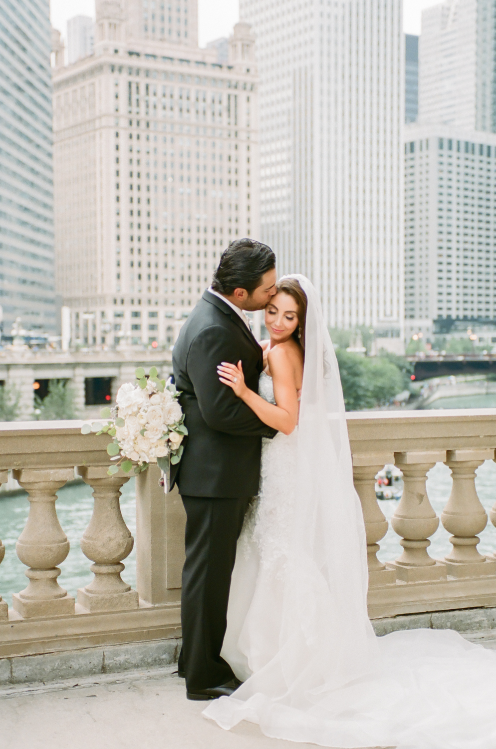 Bride and groom on Michigan Avenue in Chicago, Chicago fine art wedding photography