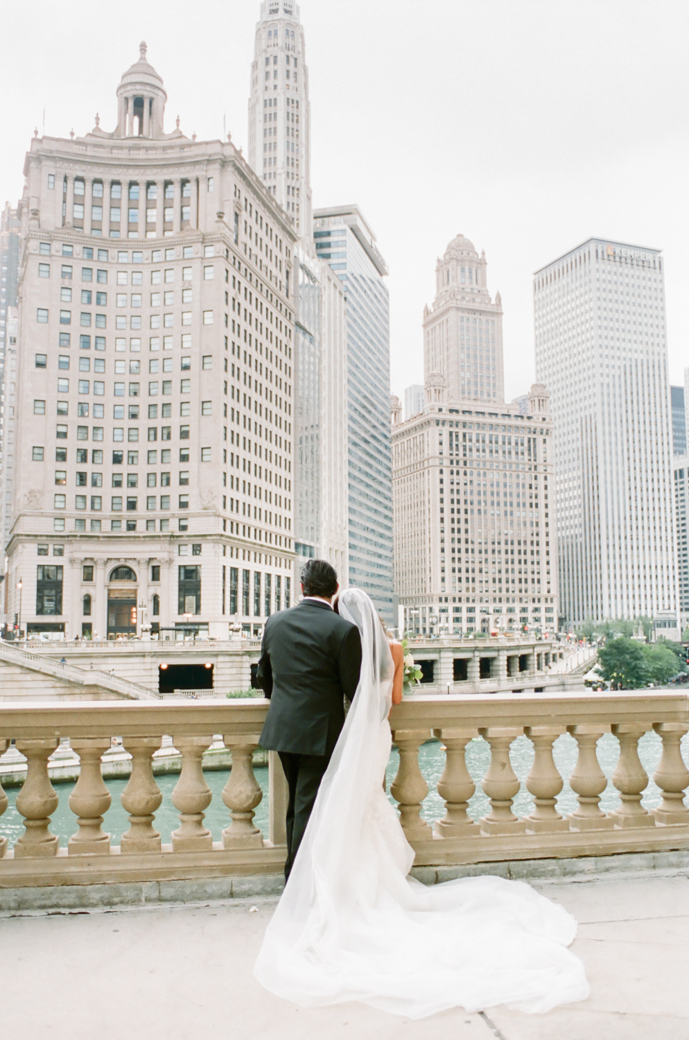 Bride and groom on Michigan Avenue in Chicago, Chicago fine art wedding photography Erica Robnett Photography