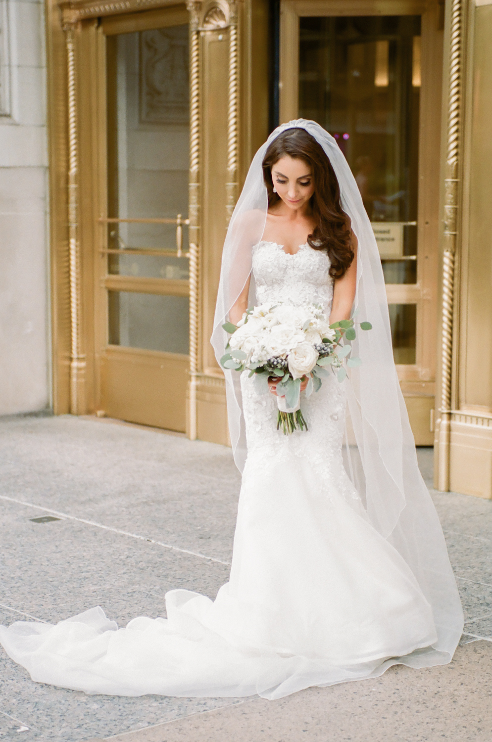 Chicago bride in front of gold door on Michigan Avenue, Destination fine art wedding photography