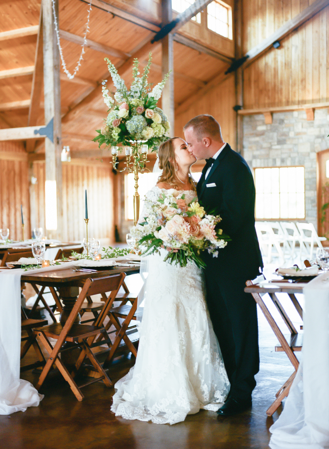 Bride and groom at Mighty Oak Lodge, Mimi's Bridal, Missouri Wedding Photographer Erica Robnett Photography