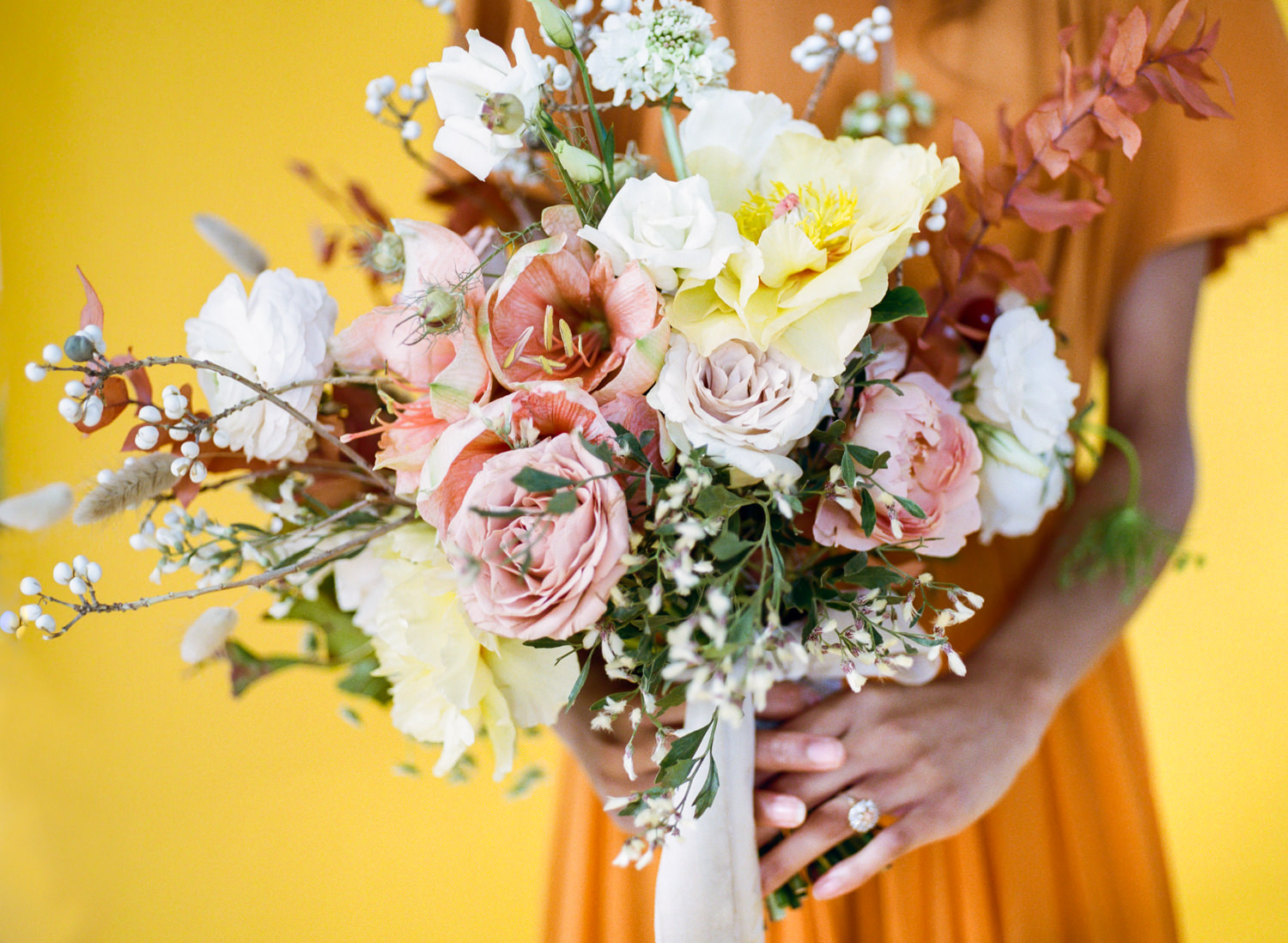 Orange Leanne Marshall gown and peach and pink bridal bouquet; St. Louis Wedding Photographer Erica Robnett Photography