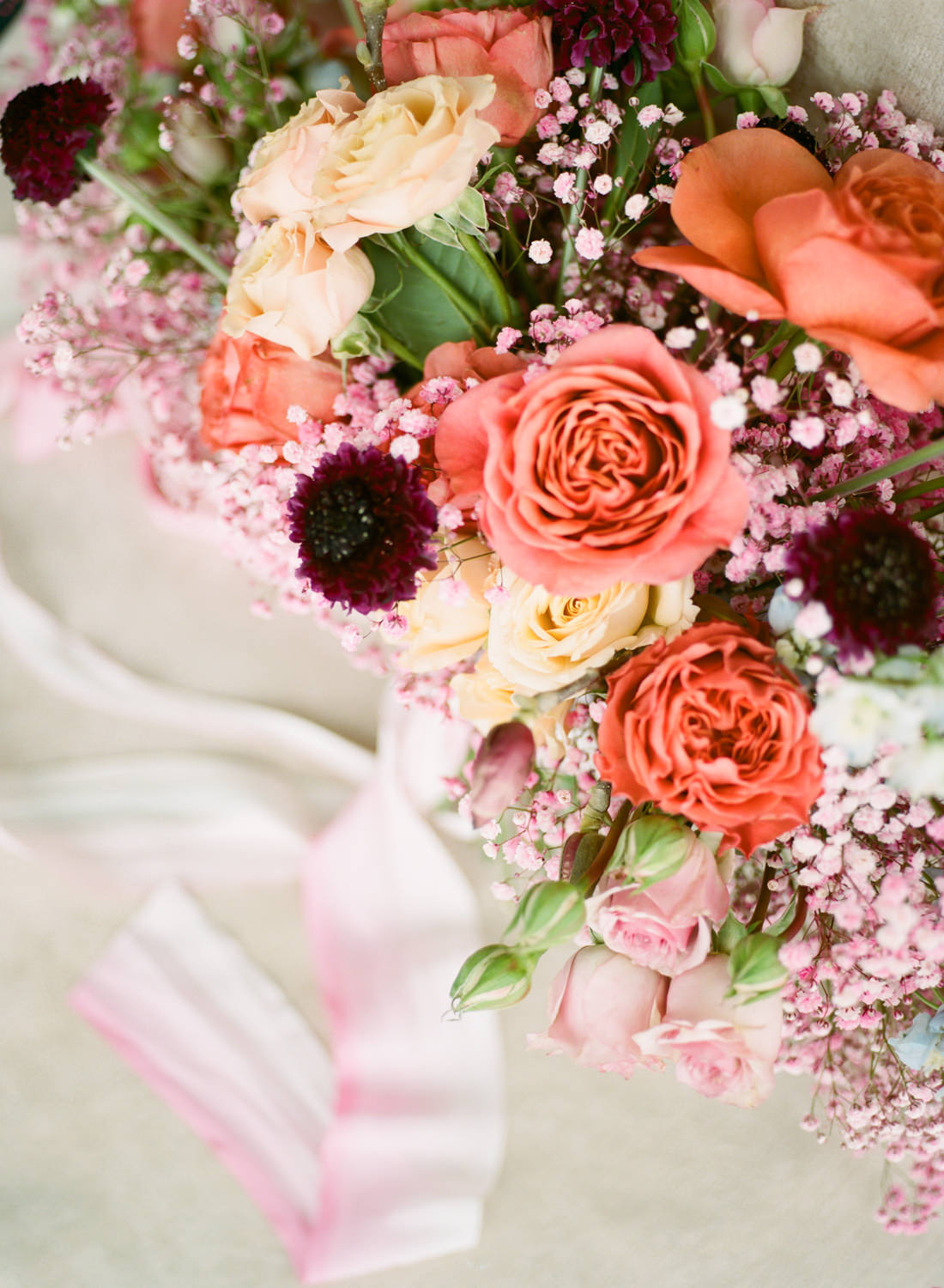 Coral peach and mauve Lavish Floral Design bridal bouquet, St. Louis fine art film wedding photographer Erica Robnett Photography