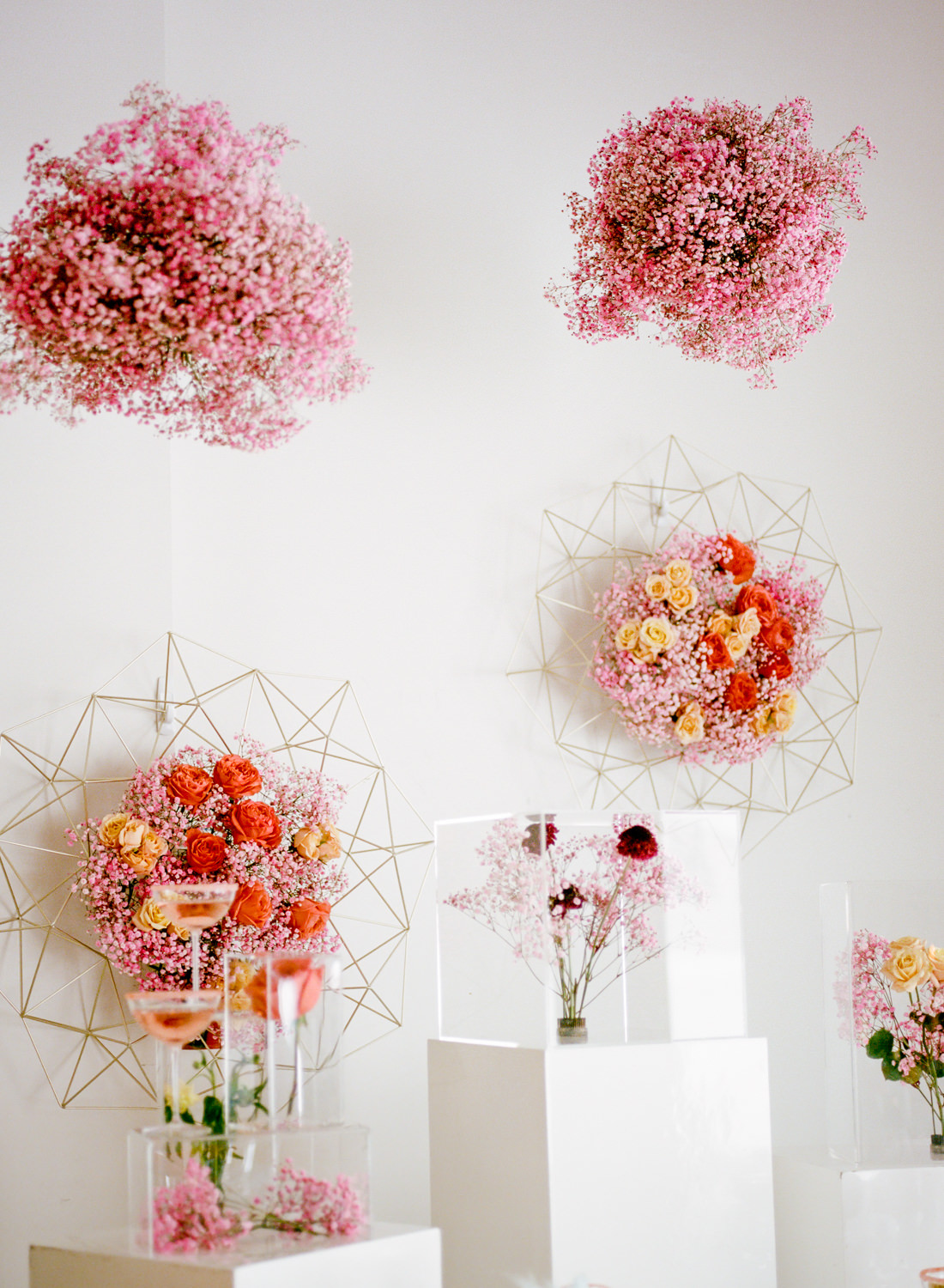 Lavish Floral Design coral and pink floral wedding installations, Sara Elizabeth Weddings, St. Louis film wedding photographer