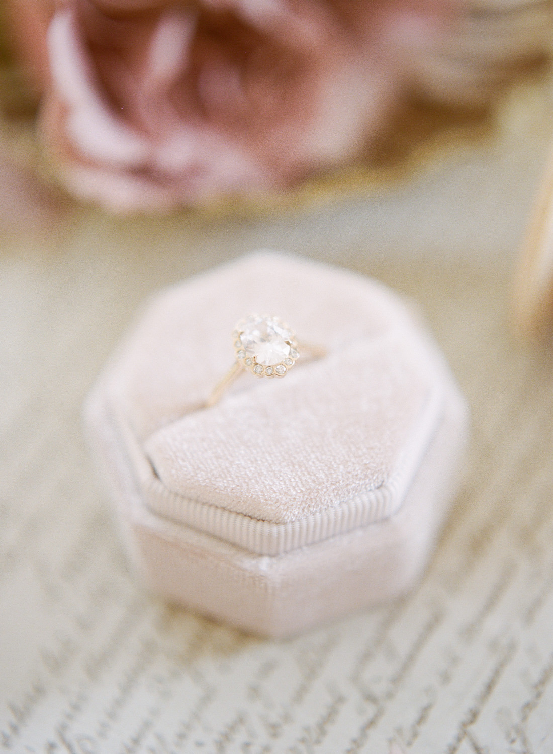 Diamond engagement ring in pink ring box