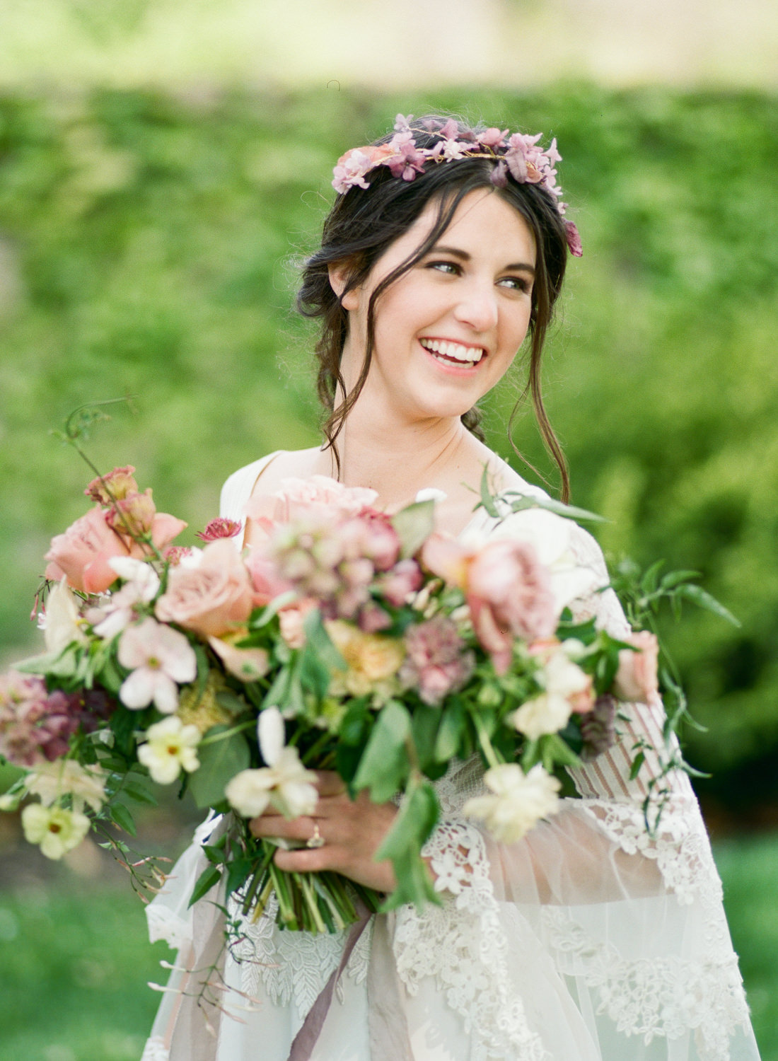 Bride smiling with pink and mauve bridal bouquet by Magnolia Belle Floral, floral crown by Erin Rhyne, St. Louis Fine Art Film Wedding Photographer Erica Robnett Photography