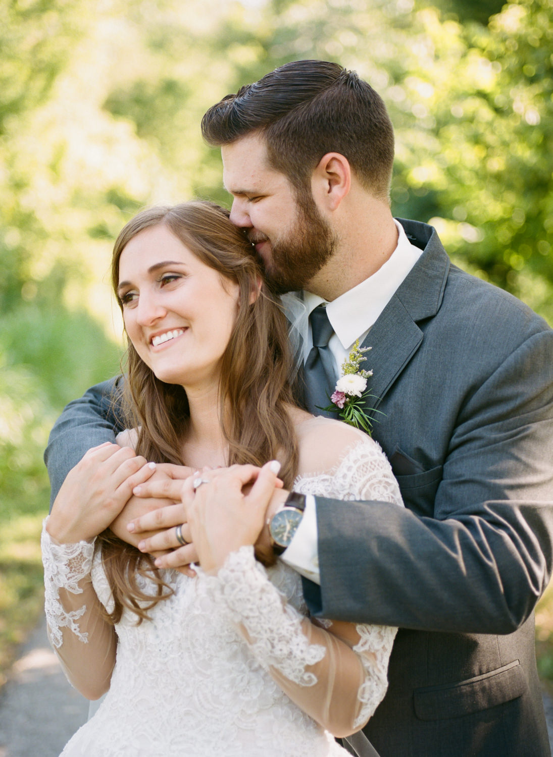 Bride and groom smiling; St. Louis fine art film wedding photographer Erica Robnett Photography