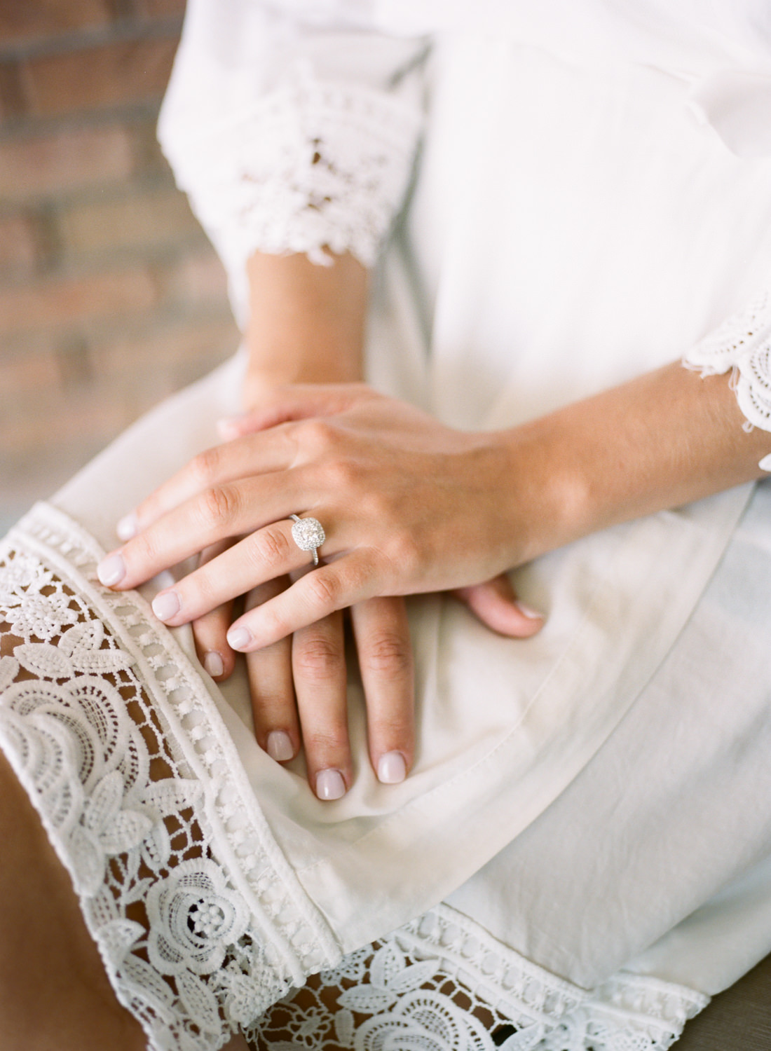 White bridal robe, diamond halo engagement ring; St. Louis wedding photographer Erica Robnett Photography