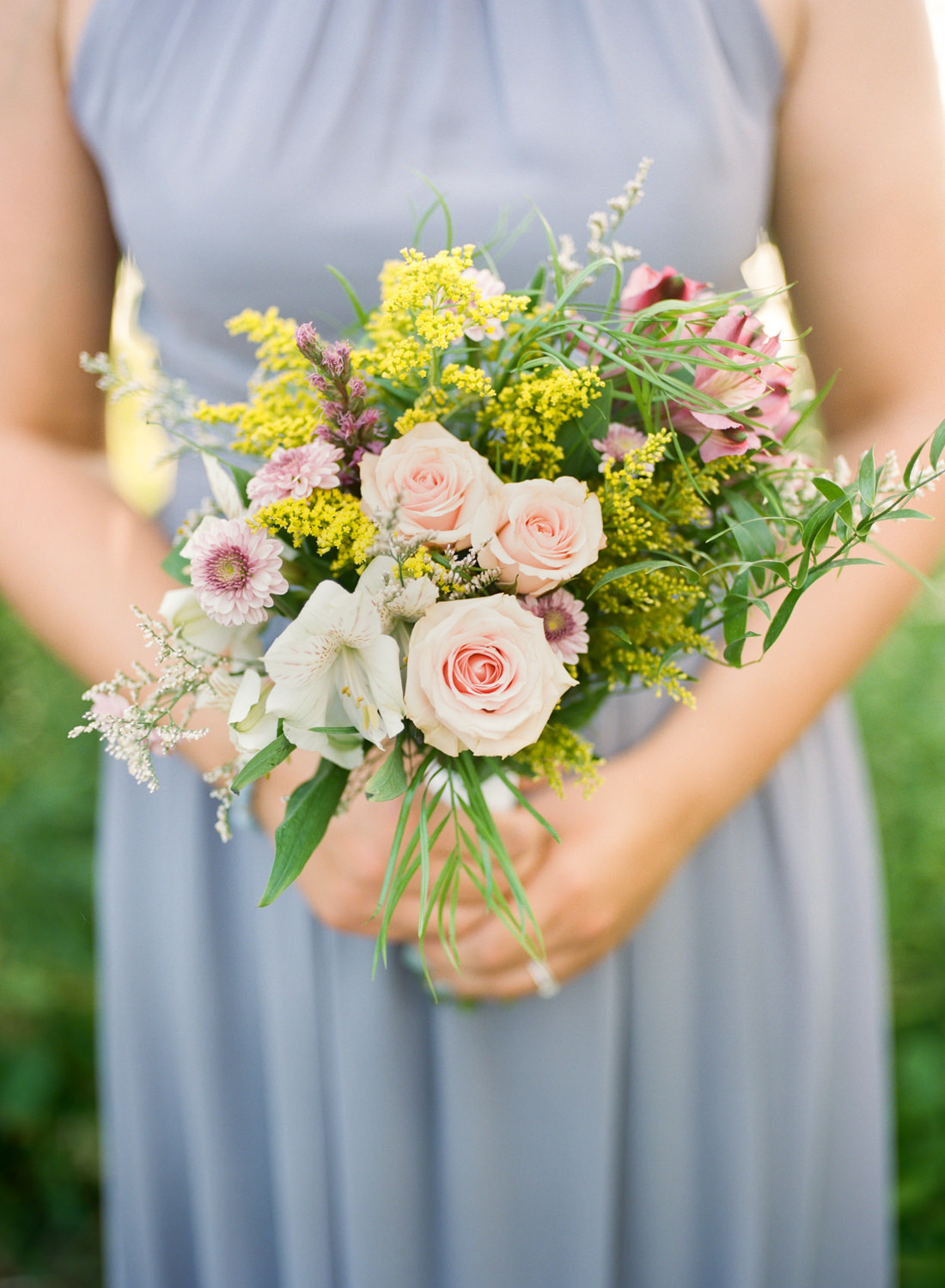 Pink and yellow wildflower bridesmaid bouquet; St. Louis fine art wedding photographer Erica Robnett Photography