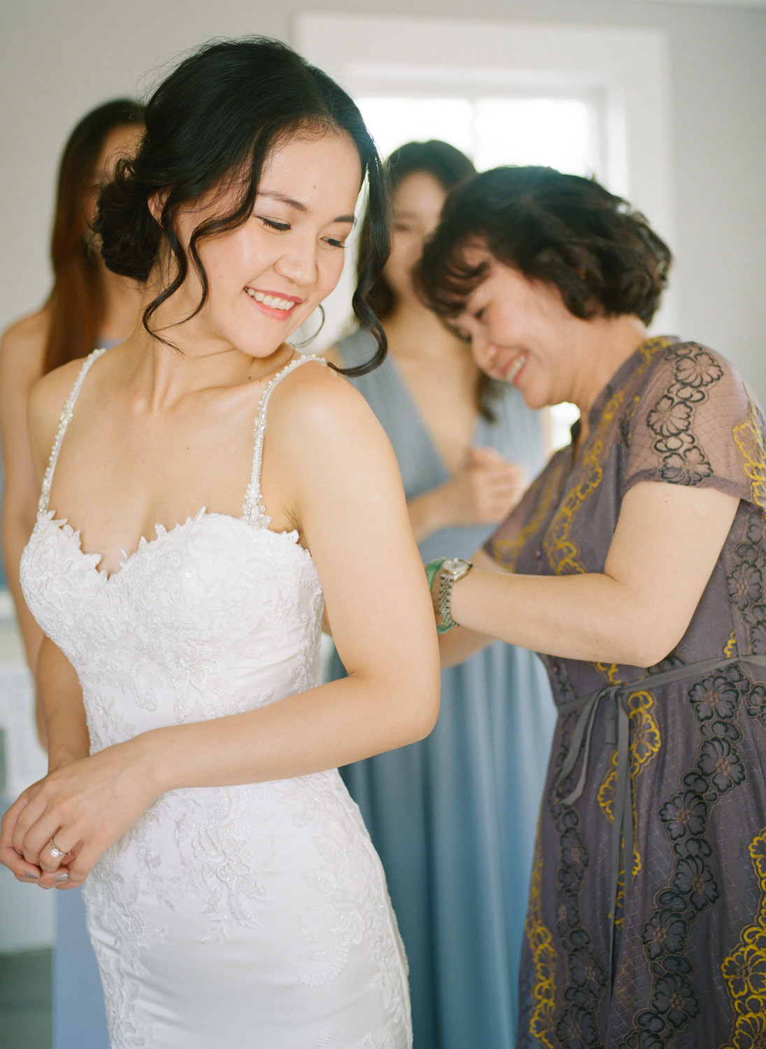 Bride getting ready with mother; St. Louis fine art film wedding photographer Erica Robnett Photography