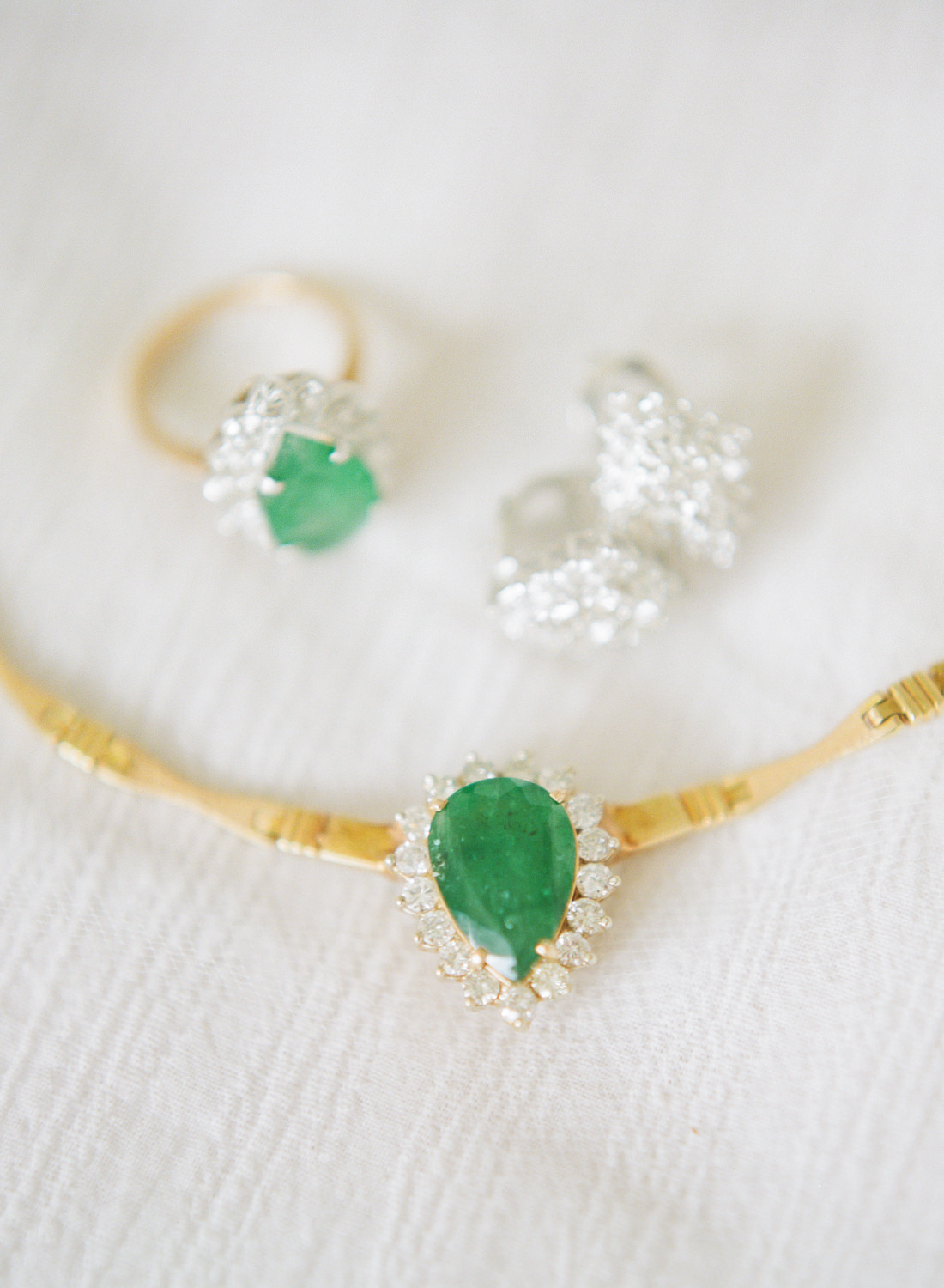 Green and gold bridal jewelry; St. Louis wedding photographer