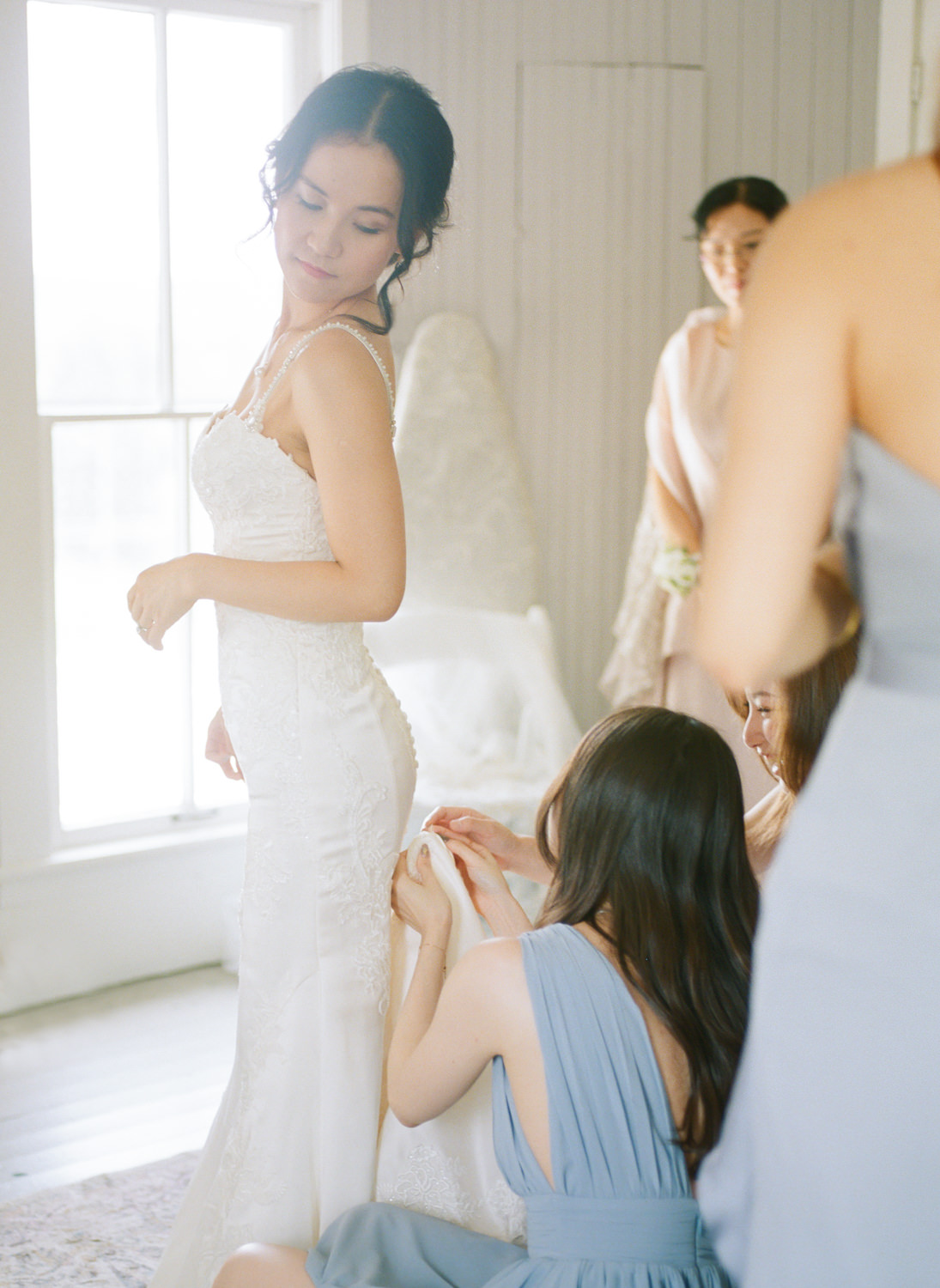 Bride getting ready at Defiance Ridge Vineyards; St. Louis fine art film wedding photographer Erica Robnett Photography