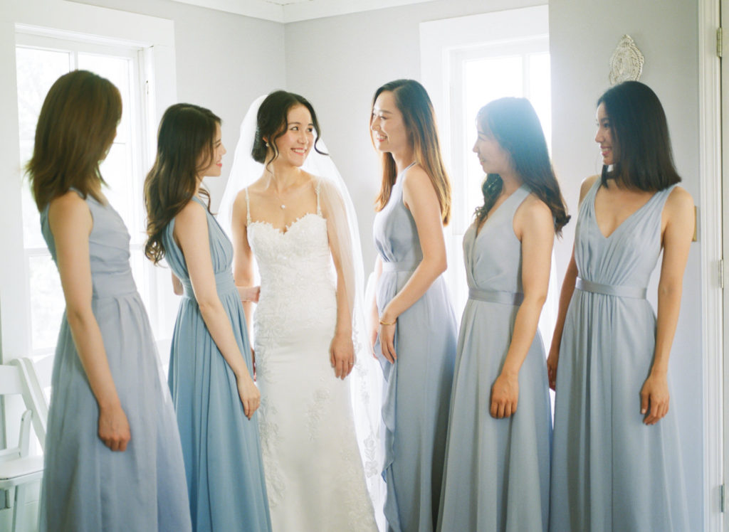 Bride and bridesmaids at Defiance Ridge Vineyards; St. Louis fine art film wedding photographer Erica Robnett Photography