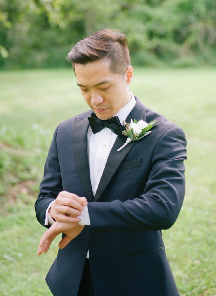 Groom getting ready at Defiance Ridge Vineyards; St. Louis fine art film wedding photographer Erica Robnett Photography