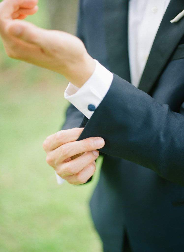 Groom getting ready at Defiance Ridge Vineyards; St. Louis fine art film wedding photographer Erica Robnett Photography