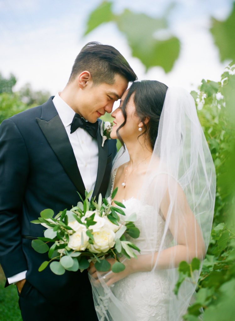 Bride and groom portrait at Defiance Ridge Vineyards; St. Louis fine art film wedding photographer Erica Robnett Photography