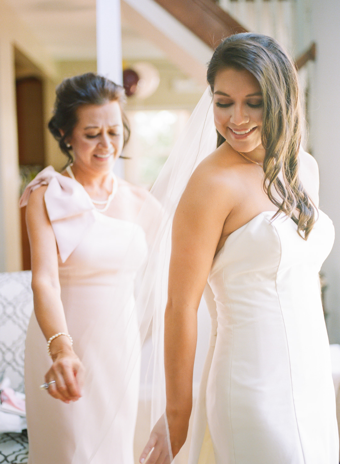 Mom helping bride get ready; St. Louis fine art film wedding photographer Erica Robnett Photography