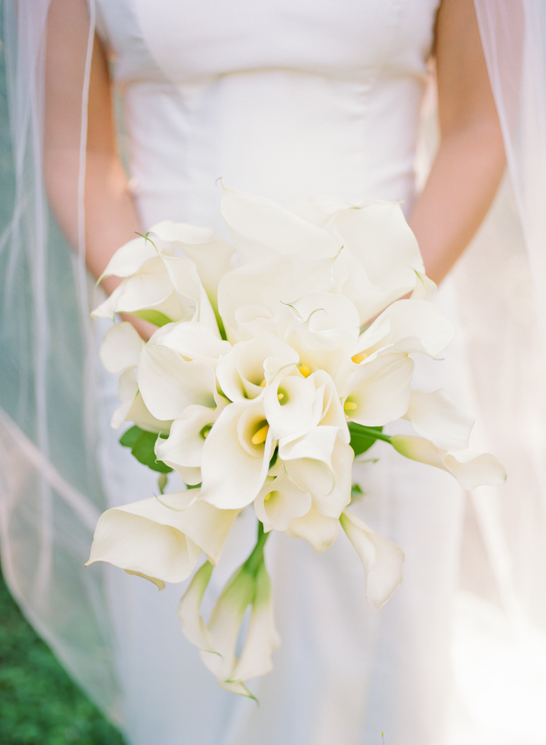 White lily bridal bouquet; St. Louis fine art film wedding photographer Erica Robnett Photography