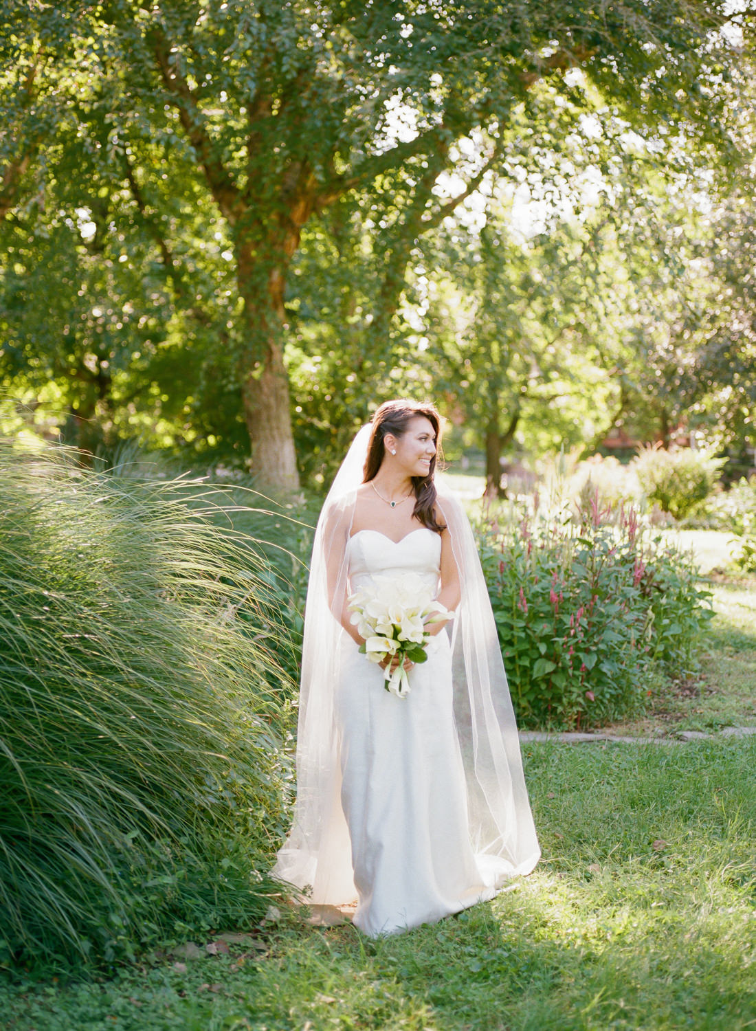Full length bridal portrait in sunlight at Lafayette Park; St. Louis fine art film wedding photographer Erica Robnett Photography