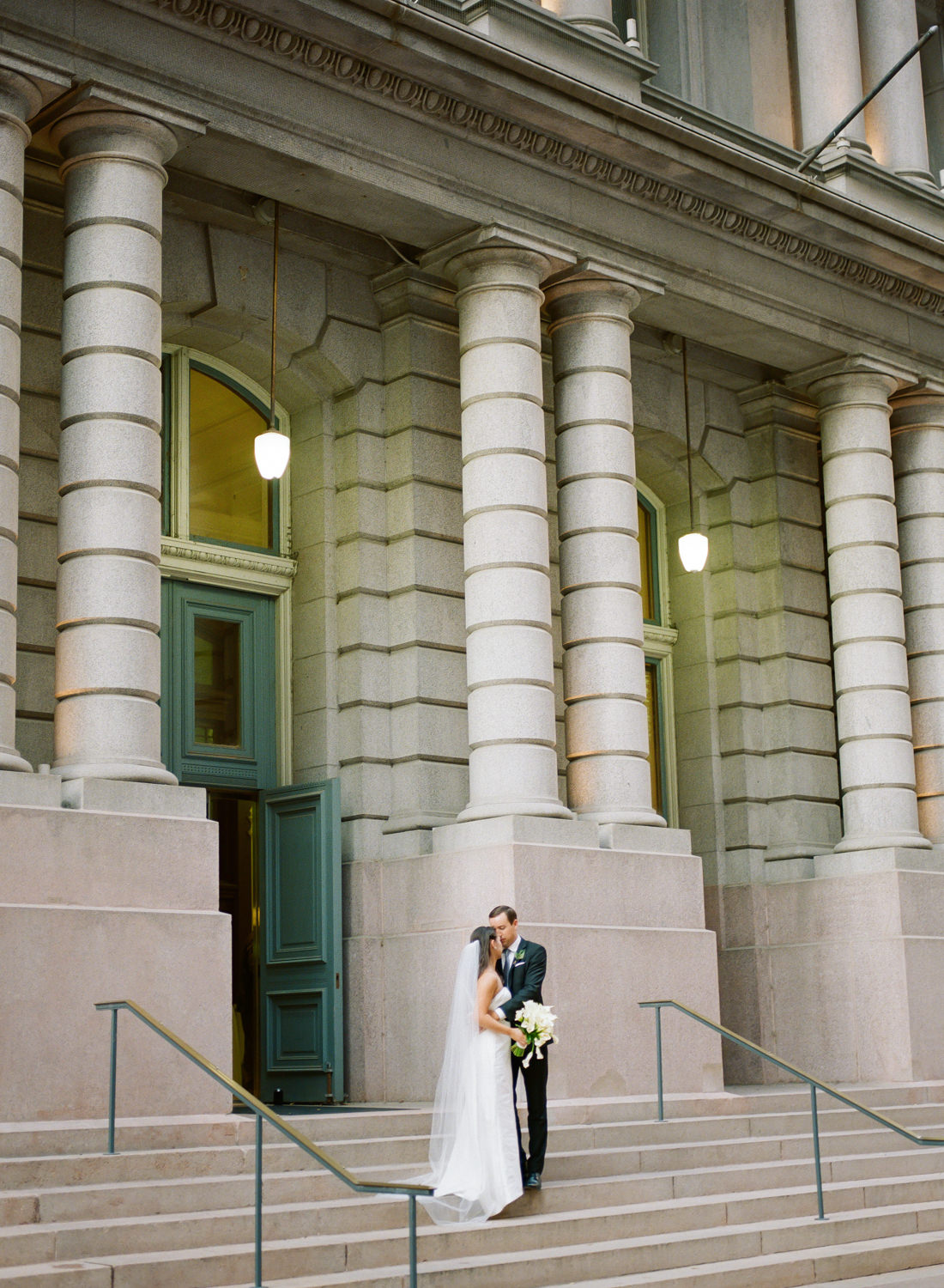 Bride and Groom Portrait at St. Louis Old Post Office and Custom House; St. Louis fine art film wedding photographer Erica Robnett Photography