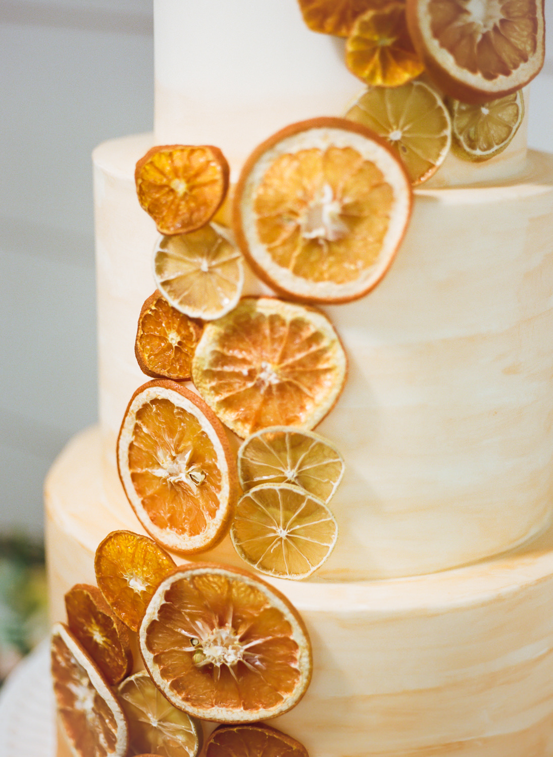 Citrus wedding cake at Missouri wedding venue Emerson Fields; St. Louis fine art film wedding photographer Erica Robnett Photography