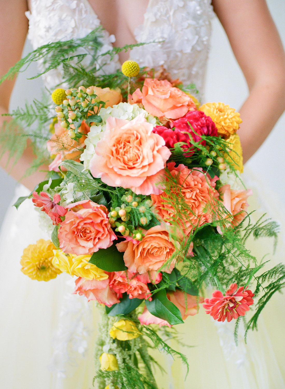 Orange and yellow bridal bouquet; St. Louis Fine art film wedding photographer Erica Robnett Photography