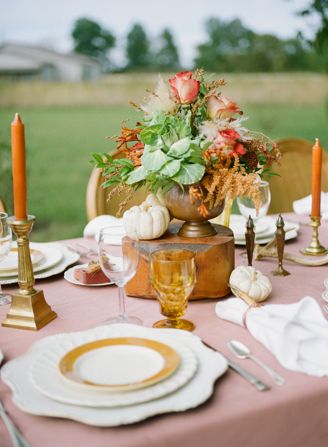 Colored glass, autumn florals, vintage china, pumpkin decor; Thanksgiving table at Emerson Fields; St. Louis fine art film wedding photographer Erica Robnett Photography
