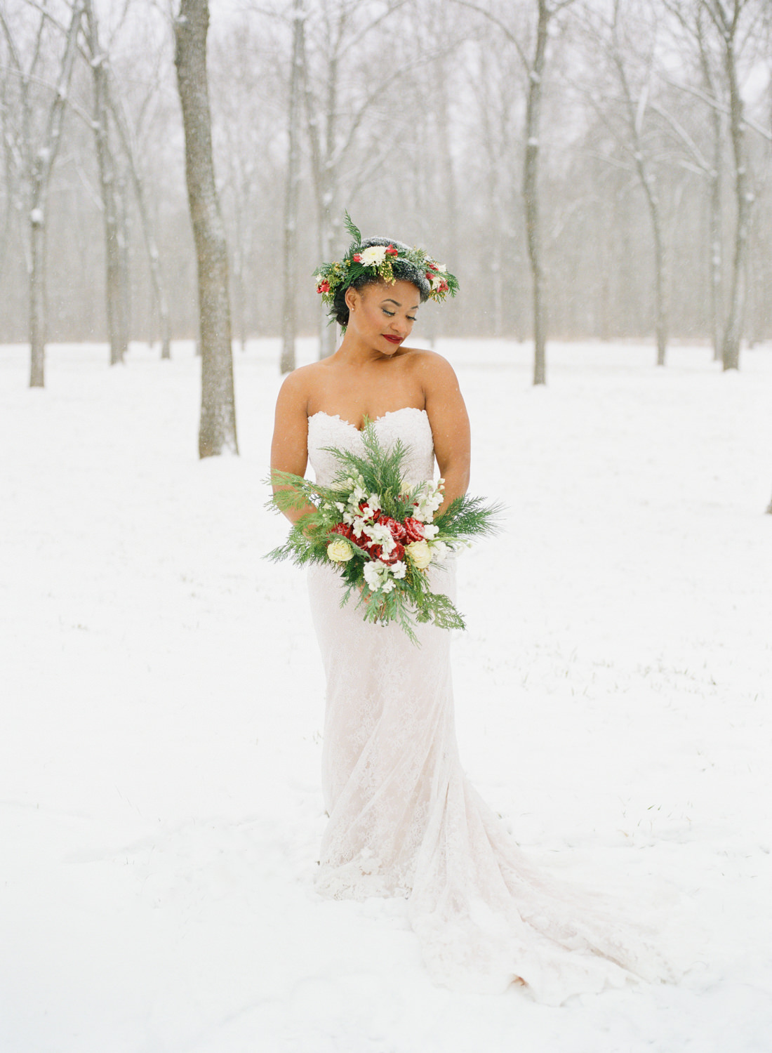 Winter wedding bride with flower crown in snow; St. Louis fine art film wedding photographer Erica Robnett Photography