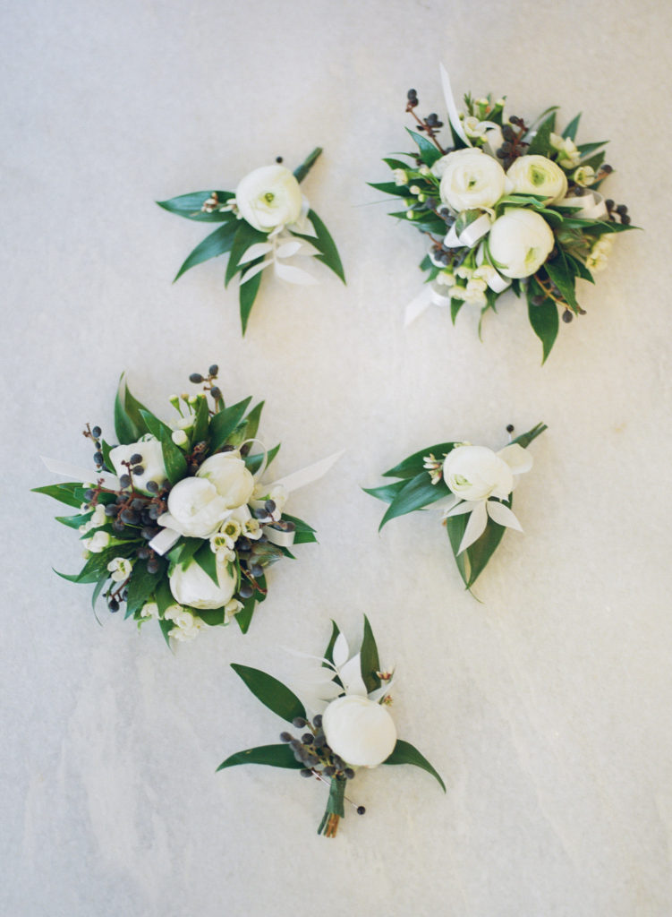 White wedding corsages; St. Louis fine art film wedding photographer Erica Robnett Photography