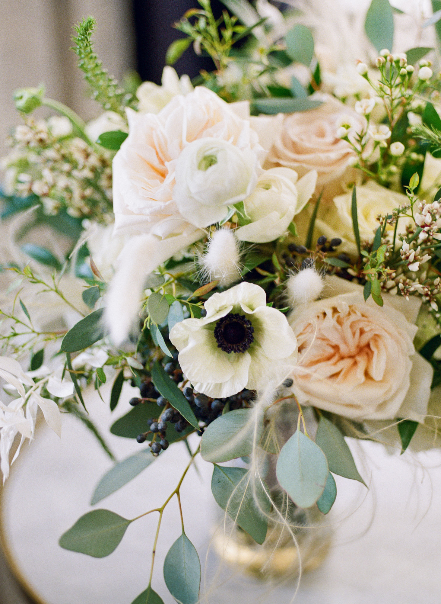 White and pastel wedding bouquet; St. Louis fine art film wedding photographer Erica Robnett Photography