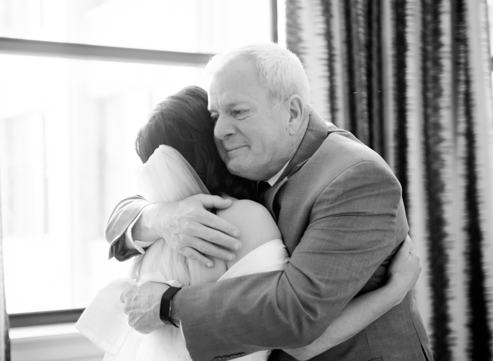 Father-daughter wedding first look