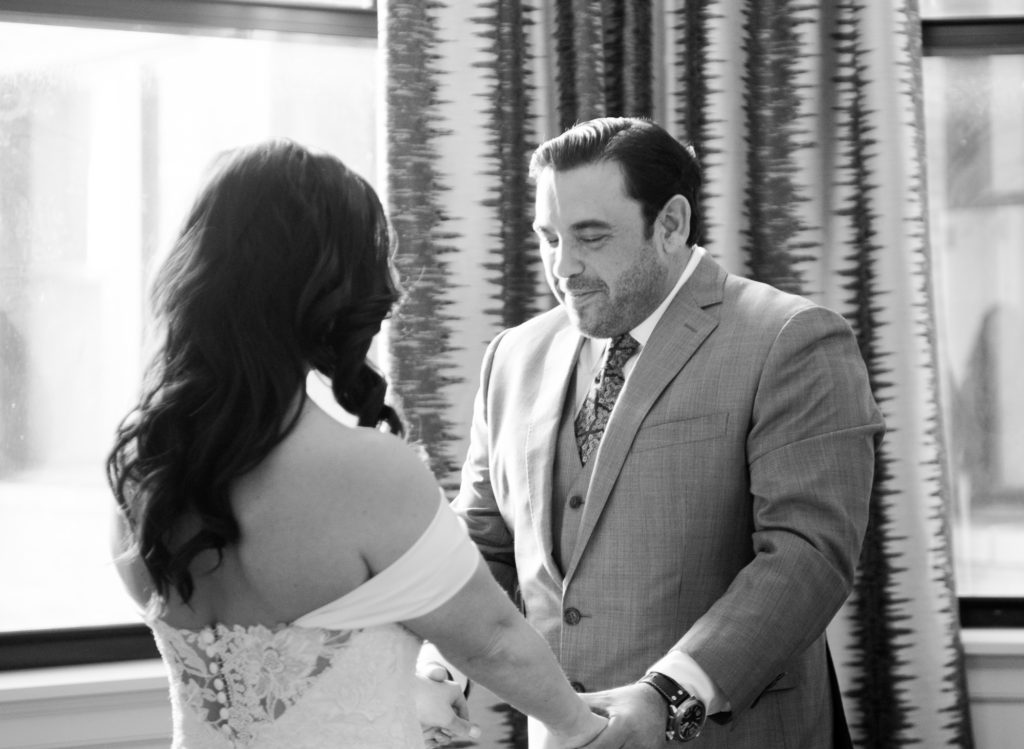 Wedding day first look between bride and groom