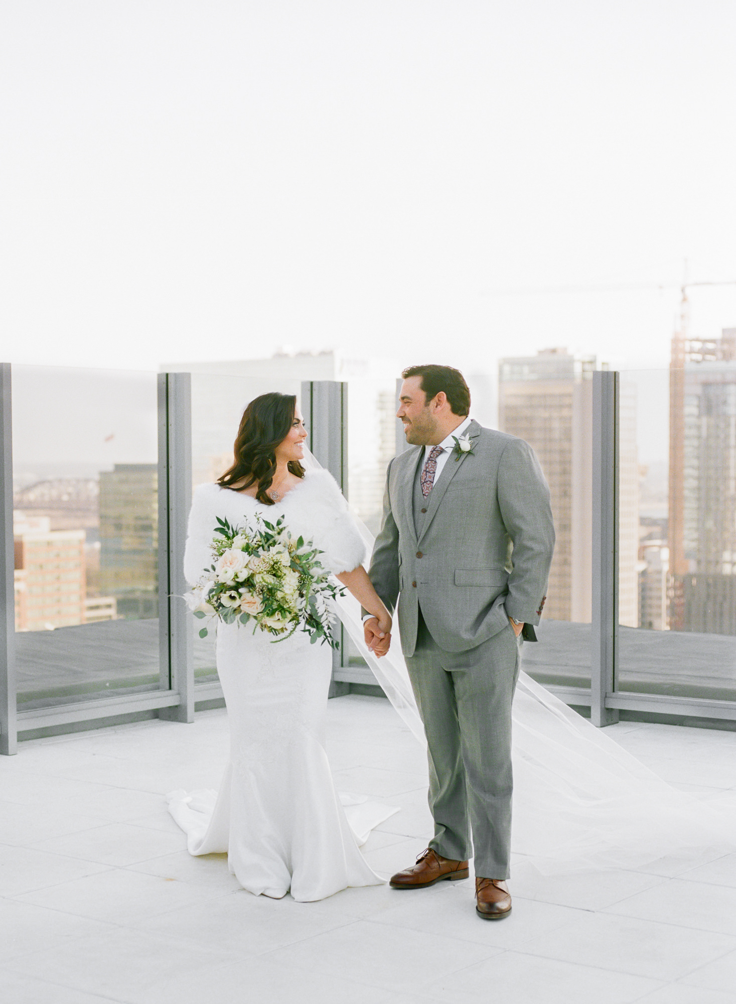 Bride and groom portrait on rooftop of Hotel St. Louis; St. Louis fine art film wedding photographer Erica Robnett Photography