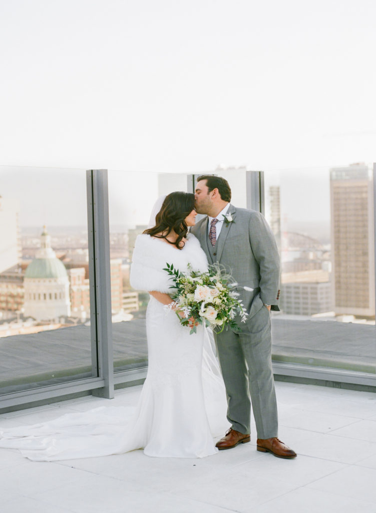 Bride and groom portrait on rooftop of Hotel St. Louis; St. Louis fine art film wedding photographer Erica Robnett Photography