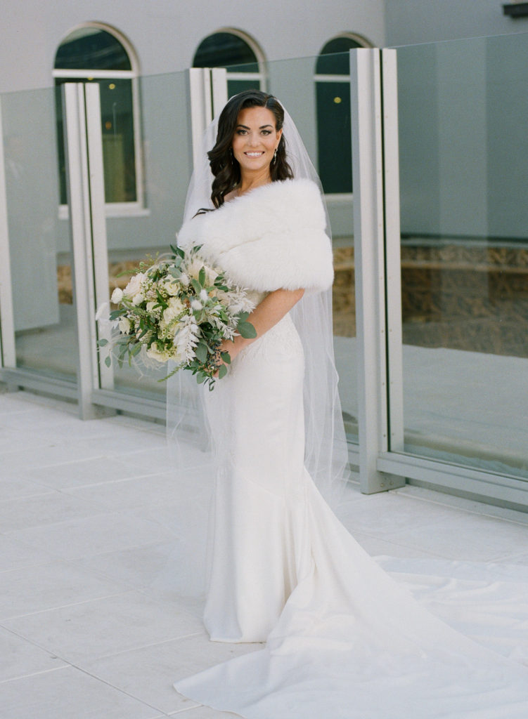 Winter bridal portrait on rooftop of Hotel St. Louis; St. Louis fine art film wedding photographer Erica Robnett Photography