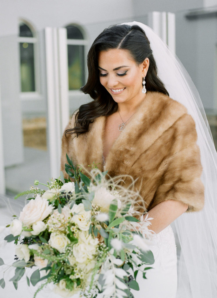Winter bridal portrait on rooftop of Hotel St. Louis; St. Louis fine art film wedding photographer Erica Robnett Photography