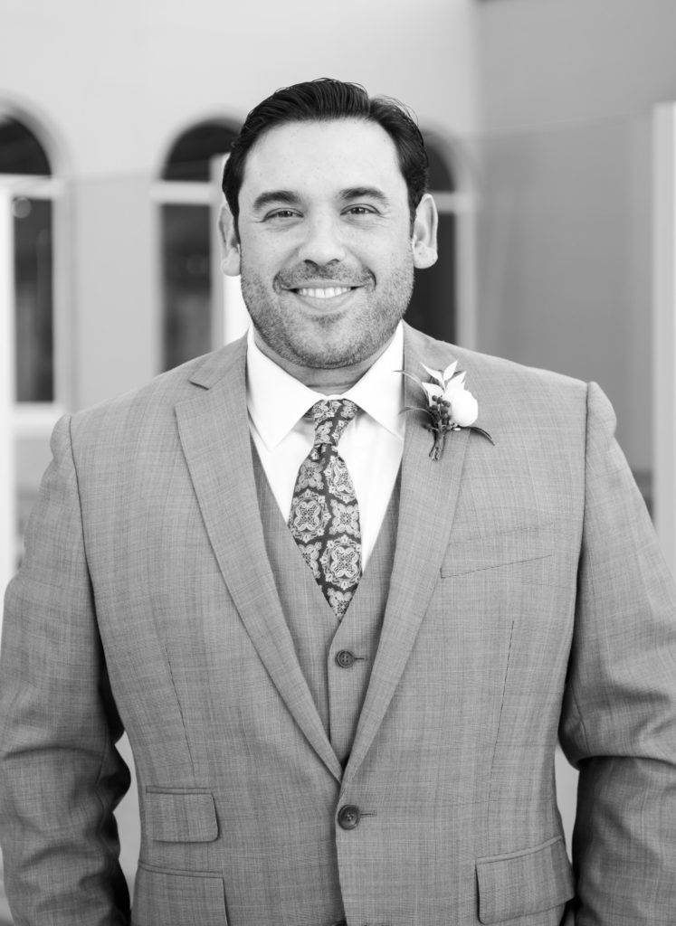 Black and white groom portrait