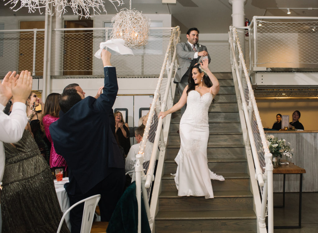 Bride and groom entrance at St. Louis wedding venue Willow; St. Louis wedding photographer