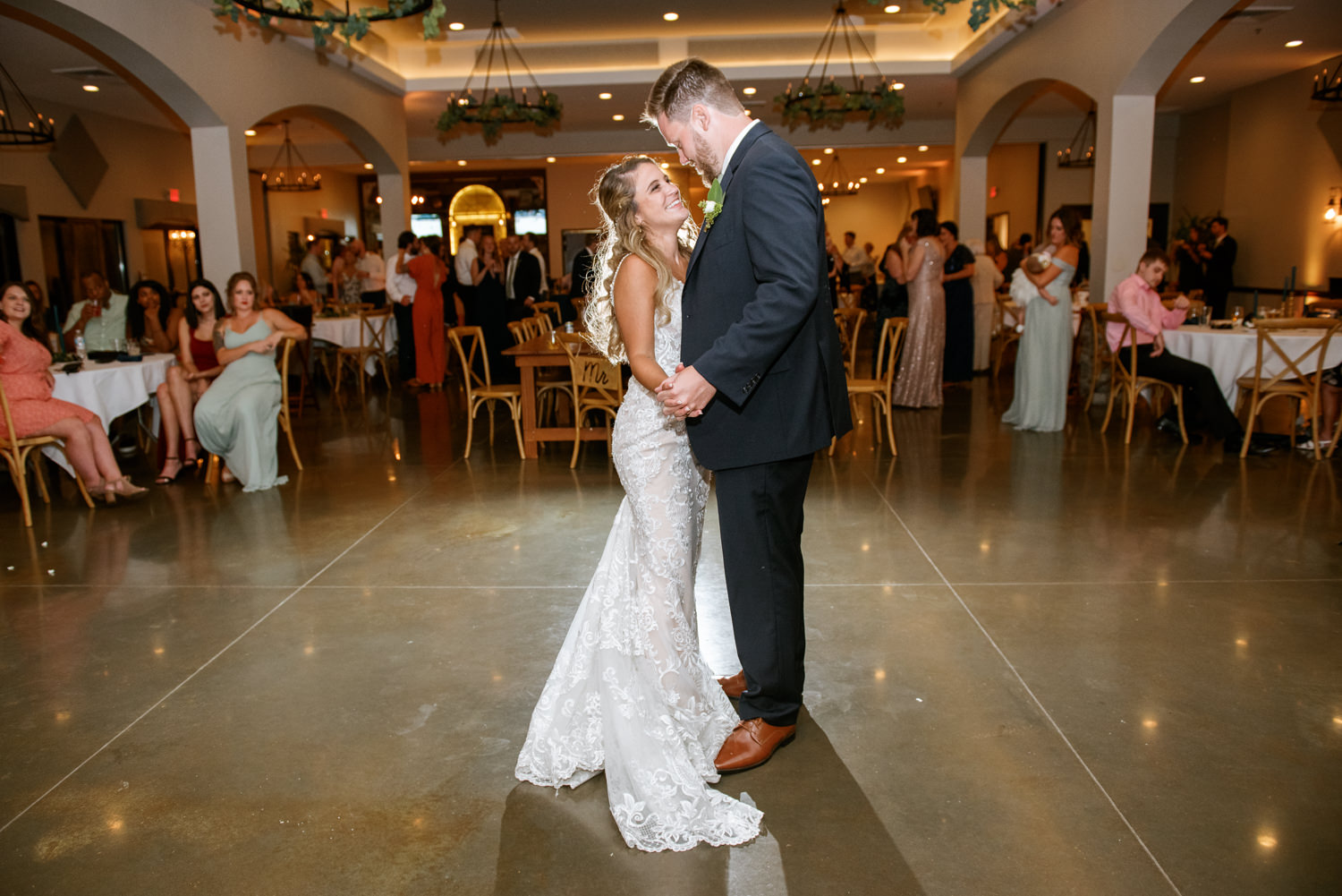 Bride and groom first dance at Missouri wedding venue Piazza Messina