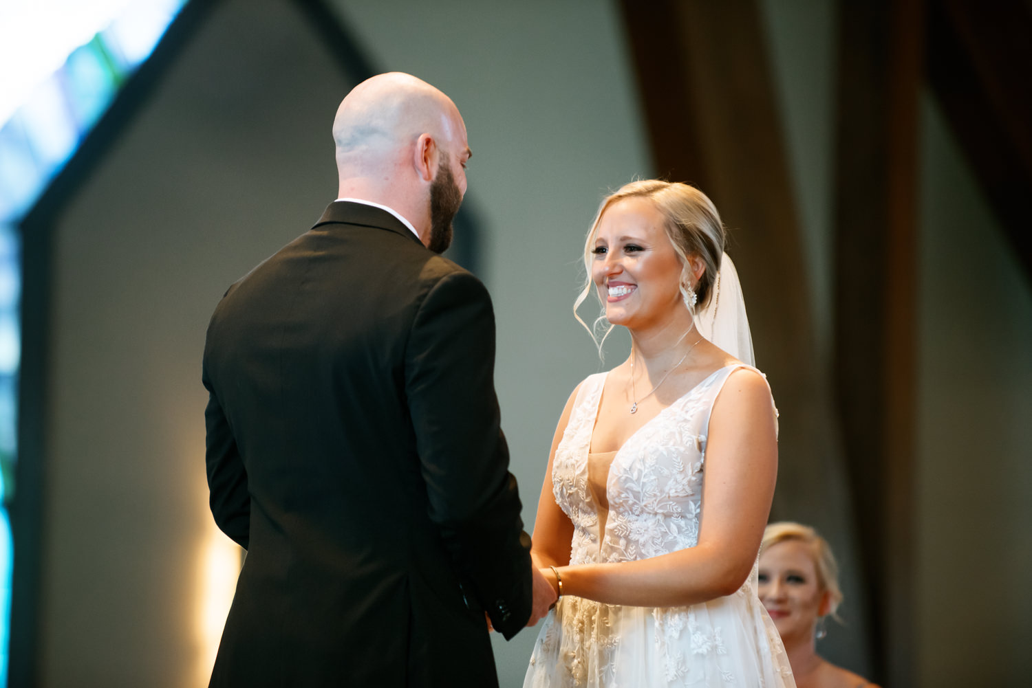 Bride looking at groom; St. Louis wedding photographer