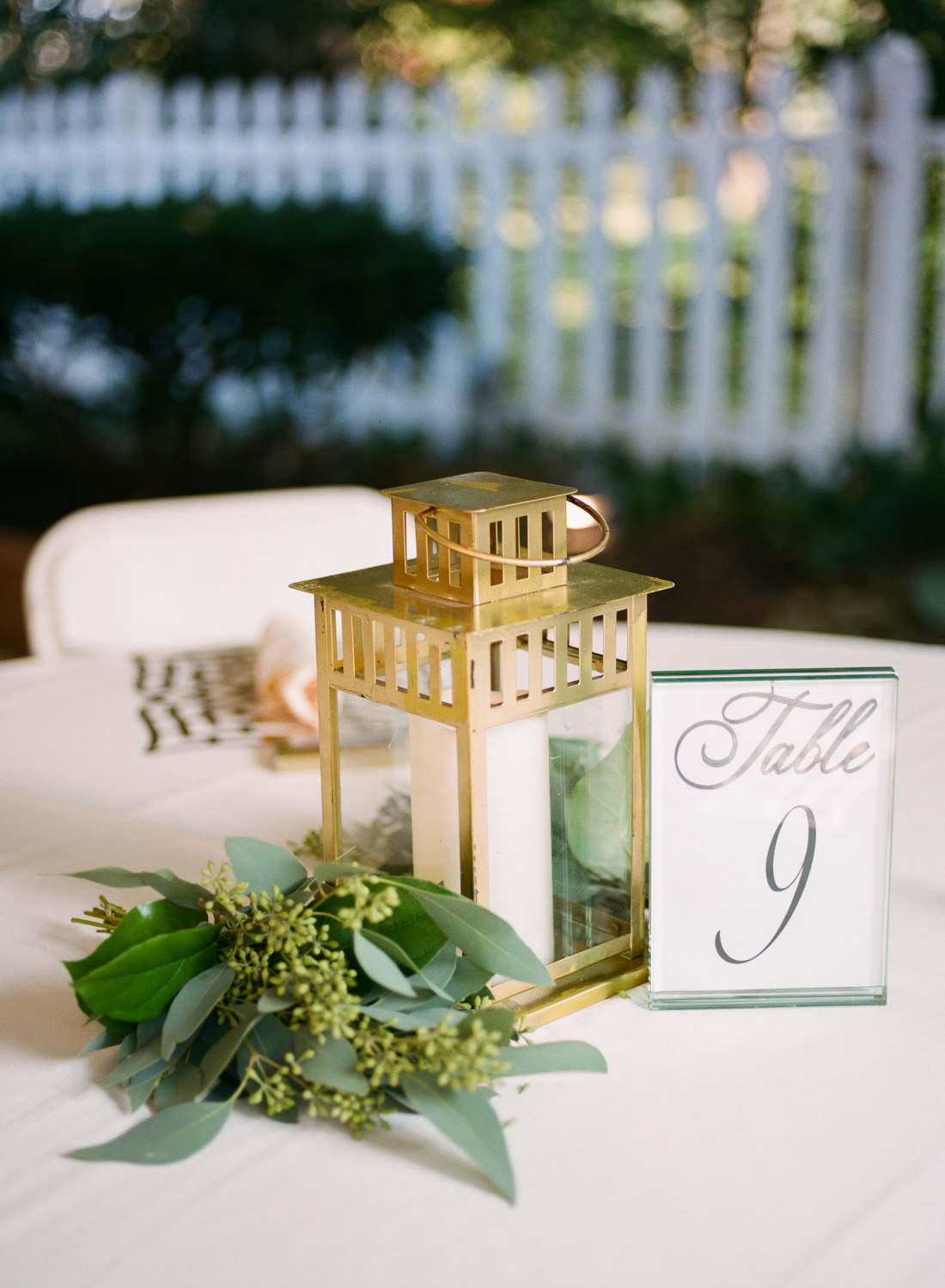 Gold lantern wedding reception decor; St. Louis wedding photographer