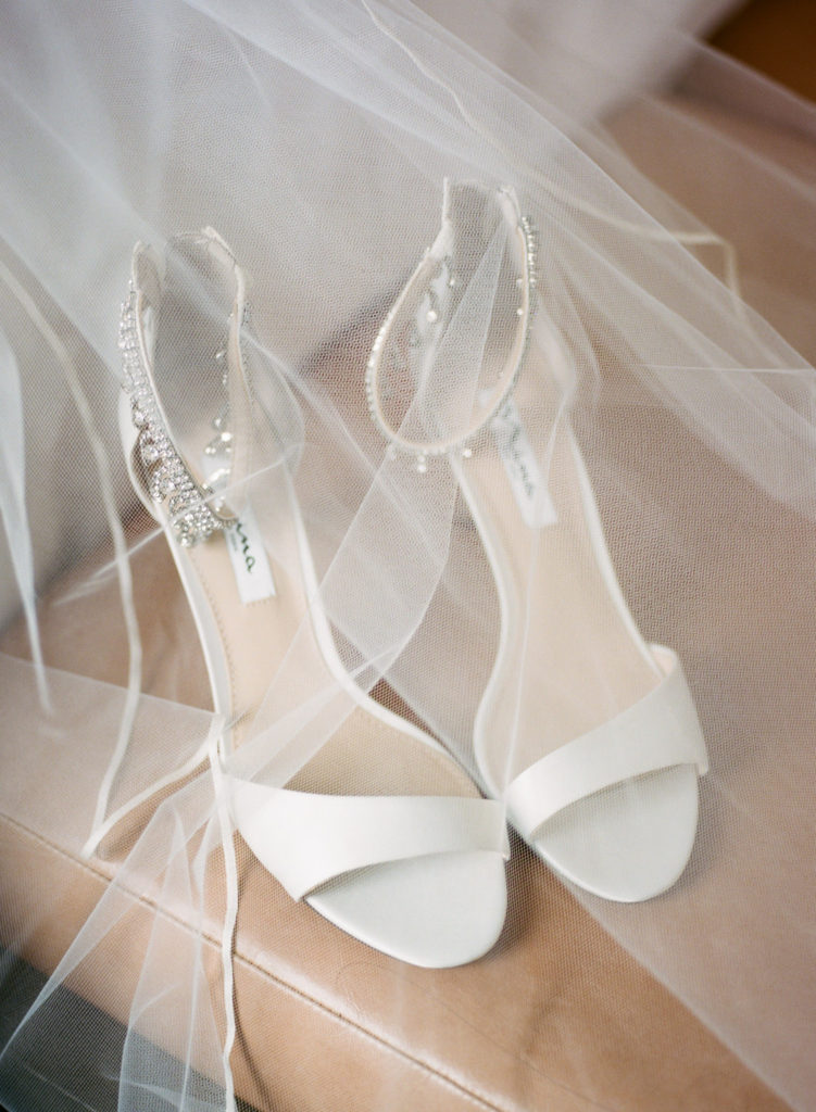 White bridal shoes; St. Louis wedding photographer