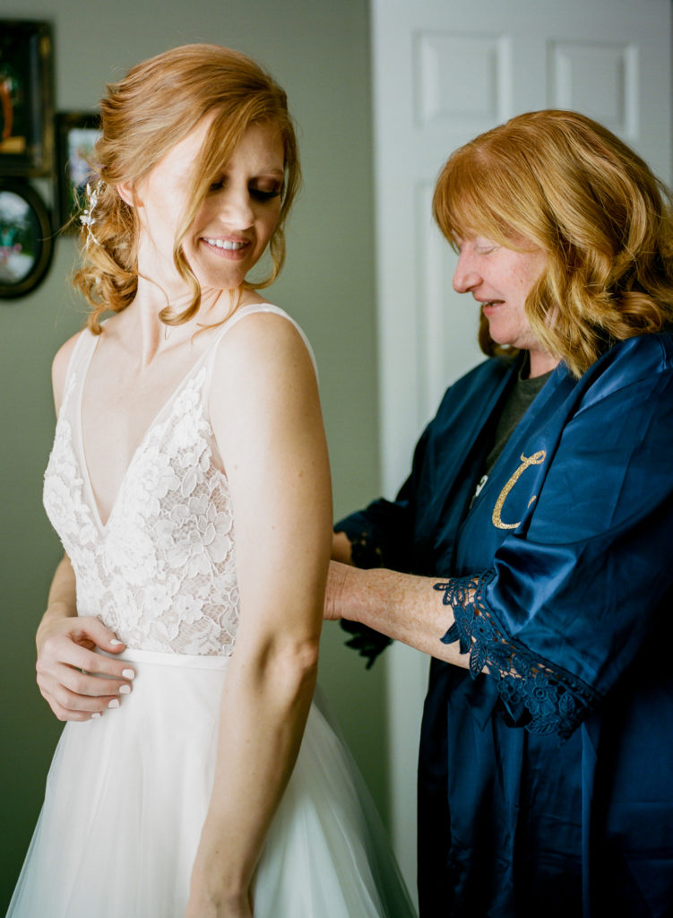 Bride getting ready; St. Louis wedding photographer