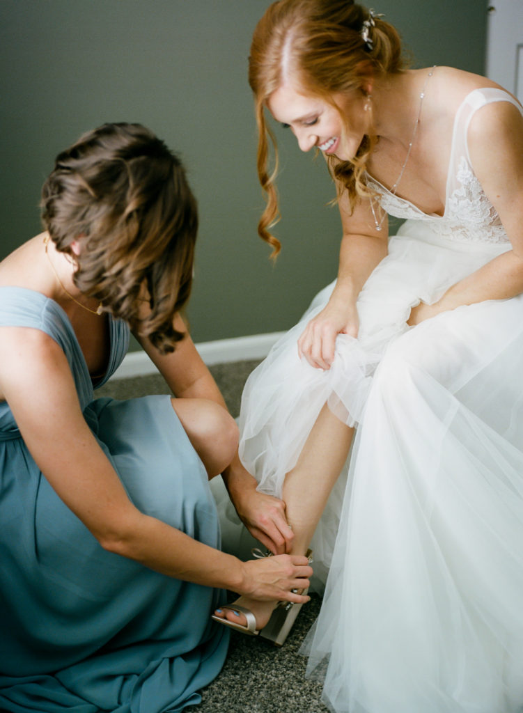 Bride getting ready; St. Louis wedding photographer