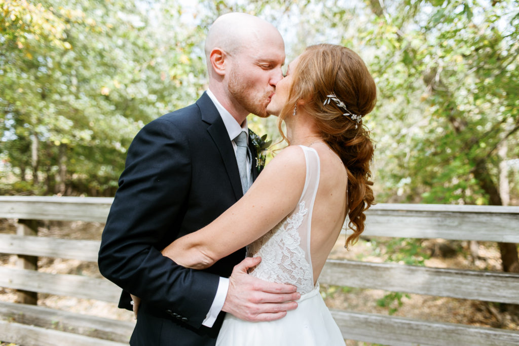 Bride and Groom kissing; St. Louis wedding photography