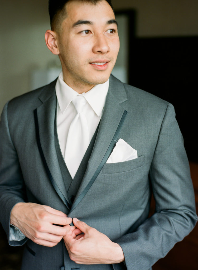 Groom getting ready; St. Louis wedding photographer