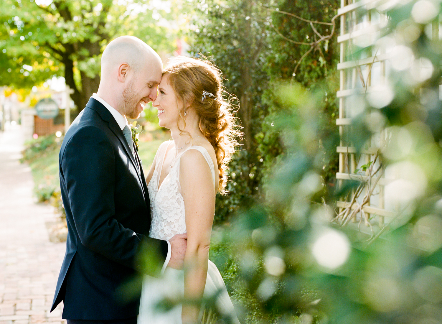 Bride and Groom Portrait at St. Charles Main Street; St. Louis film wedding photographer